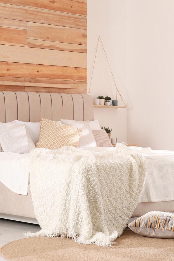 Interior of stylish bedroom with USA flag
